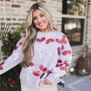 Queen Of Sparkles Lavender Red Beans & Rice Sweatshirt.